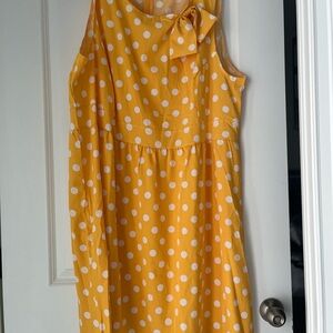 Sleeveless Yellow Polka Dot Dress with a Bow